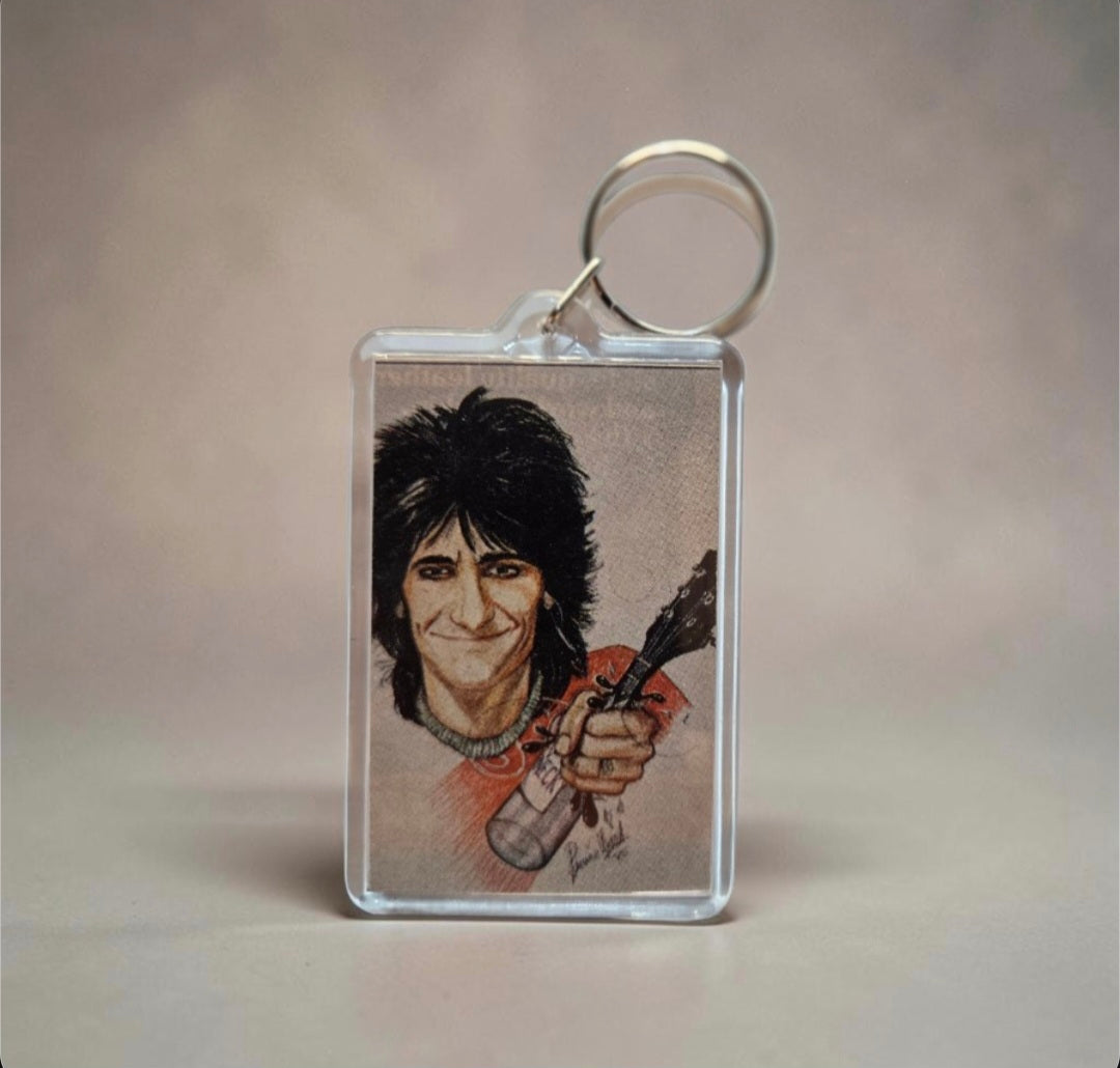 Keychain featuring an illustration of Rolling Stones guitarist Ronnie Wood holding a bottle from his 1979 solo album Gimme Some Neck