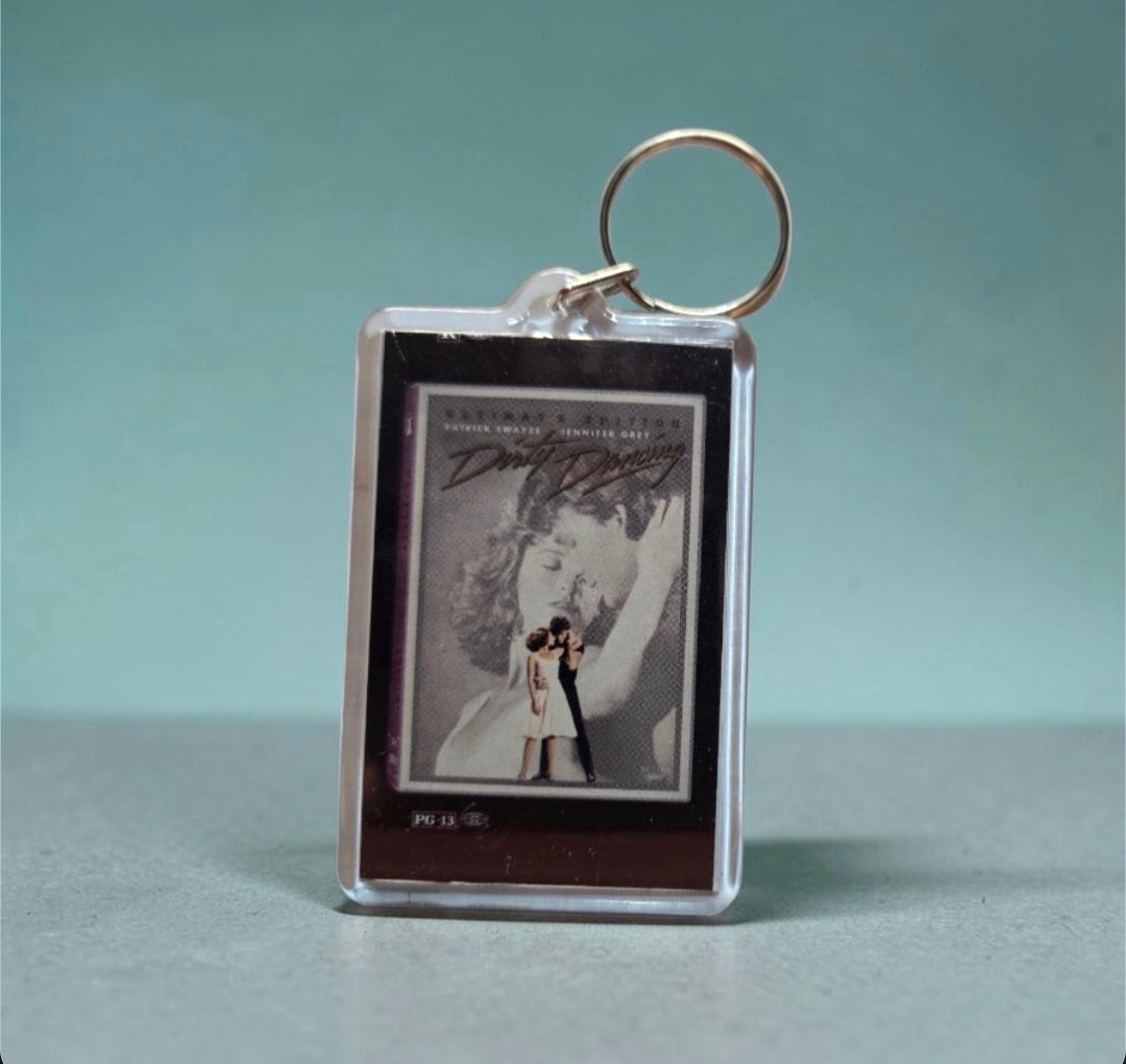 Vintage rectangular acrylic photo keychain featuring the movie poster art from the 1987 romance film Dirty Dancing