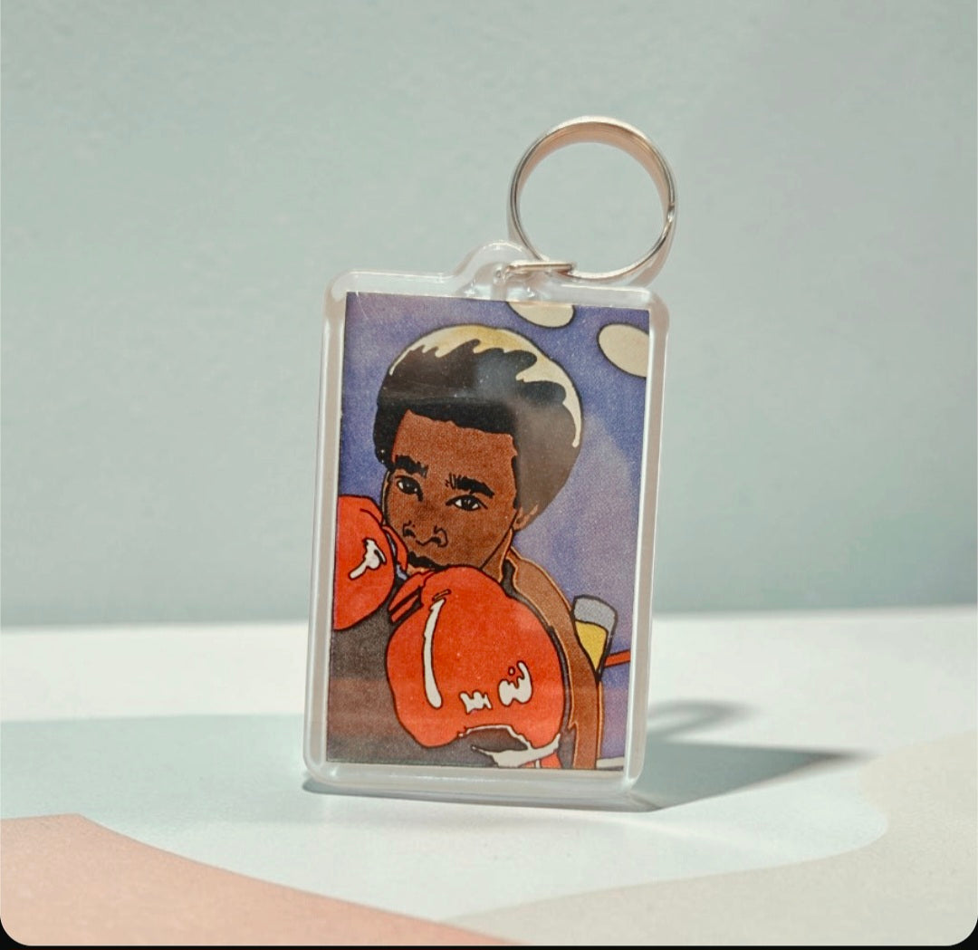 Keychain featuring stylized cartoon of legendary hall-of-fame boxer Sugar Ray Leonard
