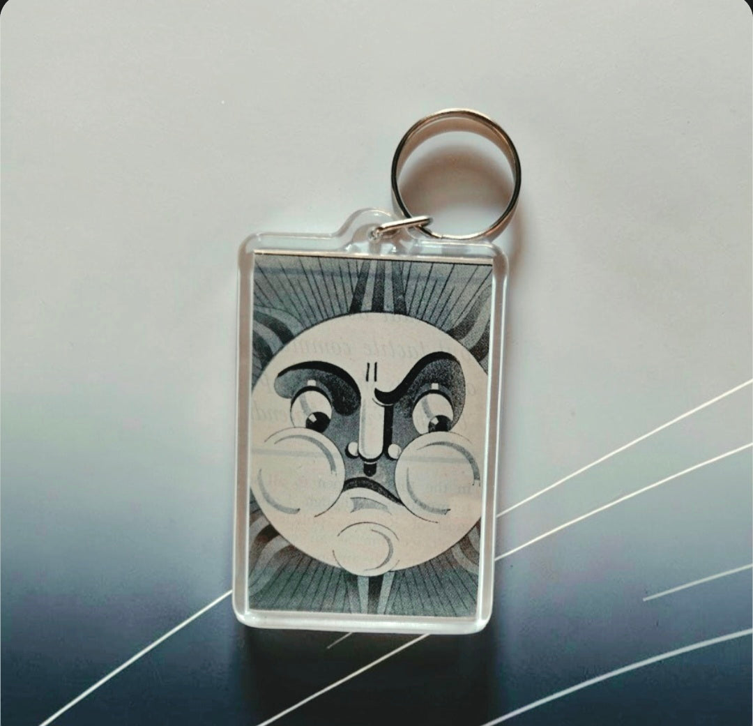 Keychain featuring the iconic vintage "Man in the Moon"