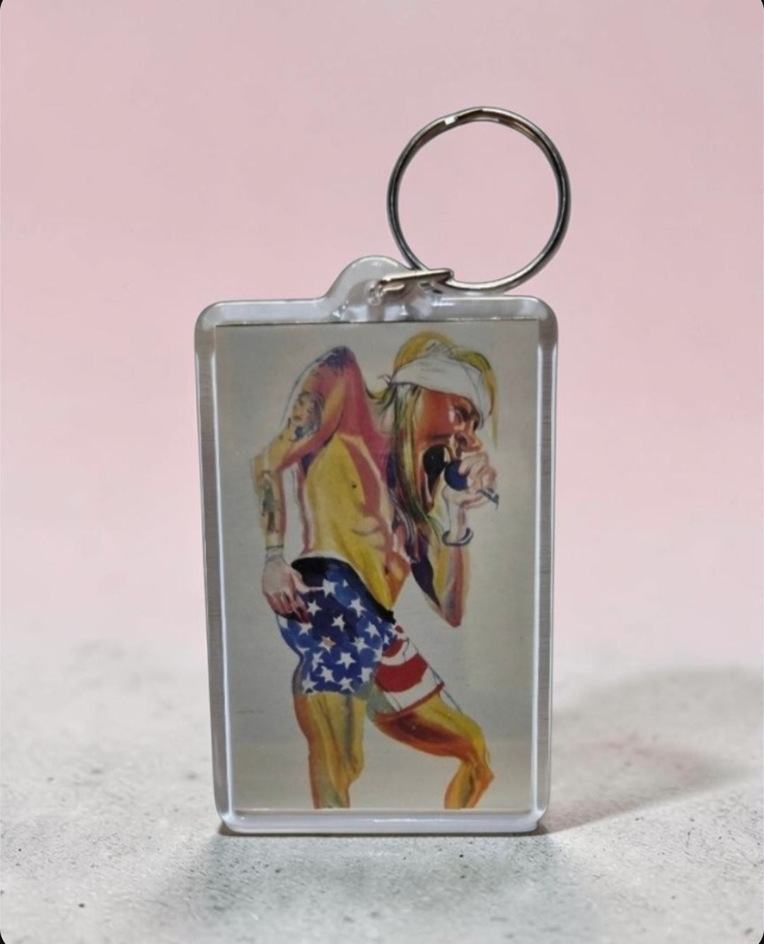 Vintage keychain features an illustration of Guns N' Roses